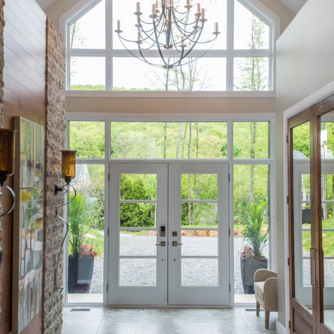 Door with muntins, sidelights and trapezoid transom, clear glass