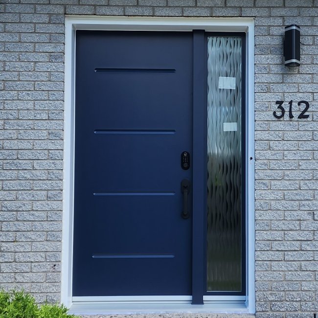 VOG ocean-blue door with fluid glass sidelight
