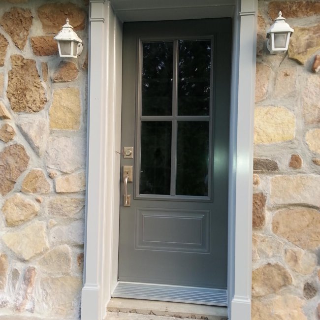 Orléans door with muntin and clear 22 × 48 glass, charcoal colour and white frame
